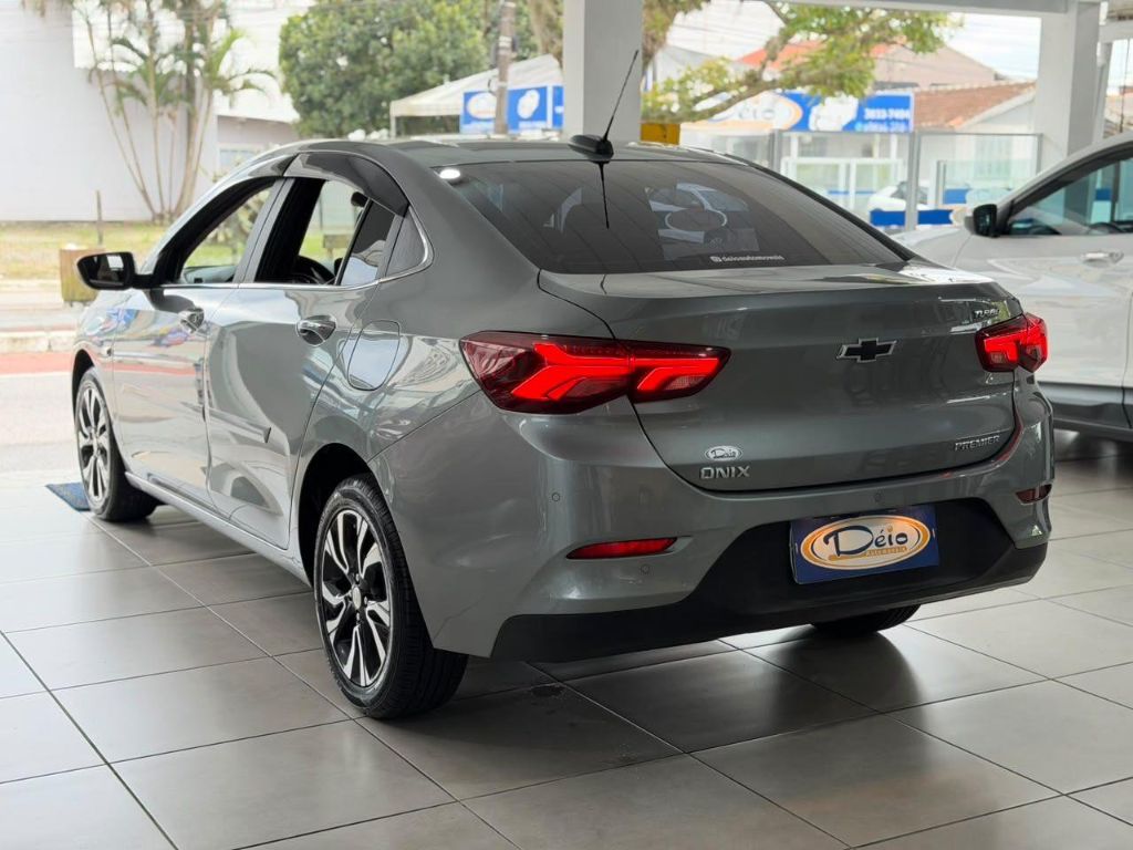 Onix SED. Plus PREM. 1.0 12V TB Flex Aut — foto 11