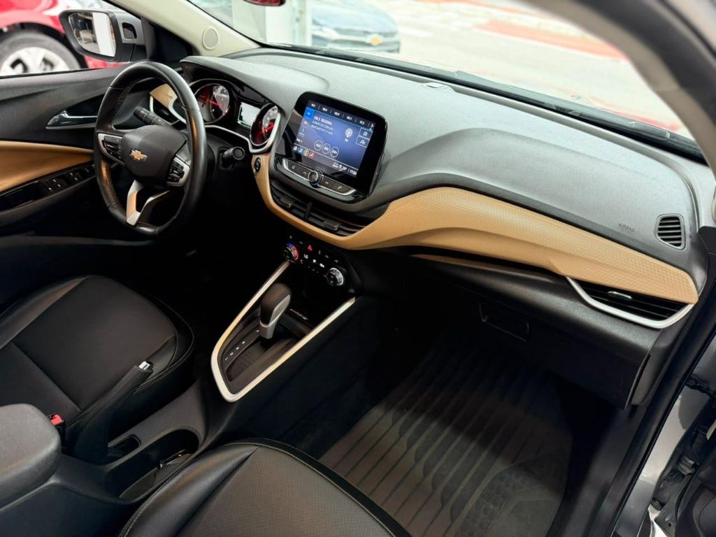 Onix SED. Plus PREM. 1.0 12V TB Flex Aut — foto 14