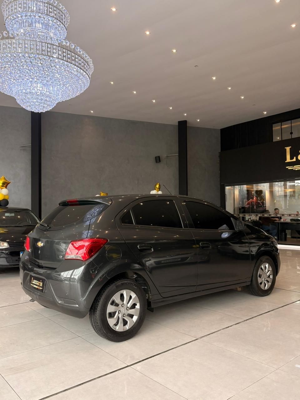 ONIX HATCH LT - FINANCIA 100% — foto 4