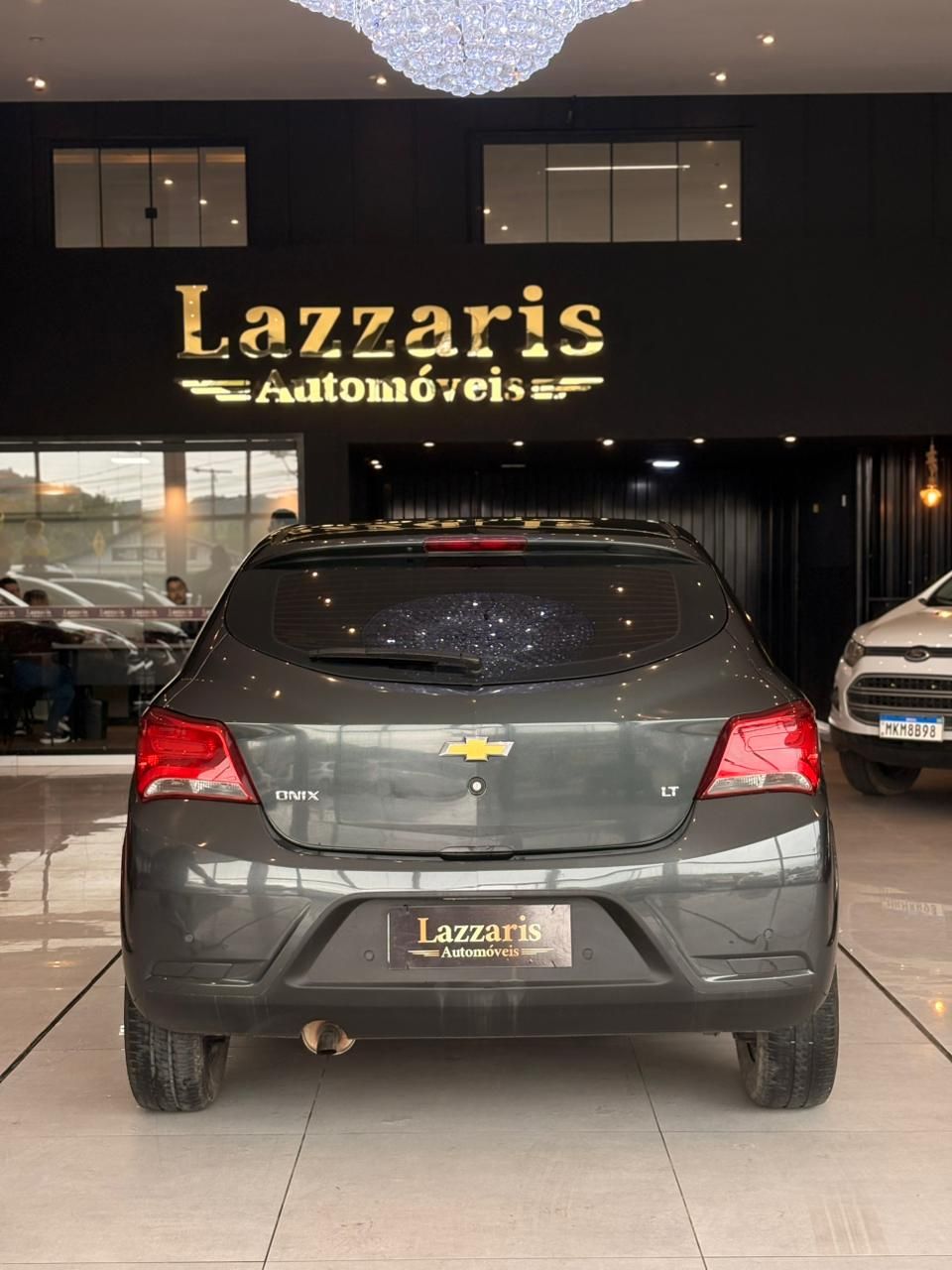 ONIX HATCH LT - FINANCIA 100% — foto 5